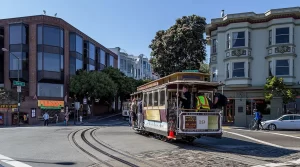 A San Francisco cable car at the Hyde Street Turnaround, preparing to climb a steep hill into Russian Hill.