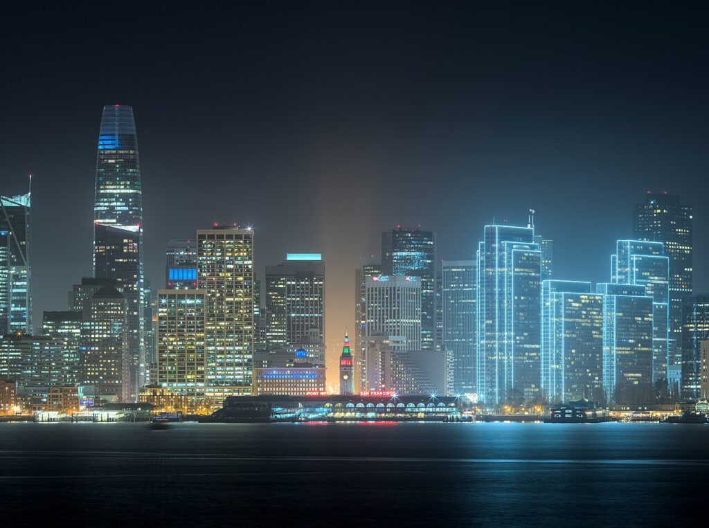 Nighttime view of the San Francisco skyline with the Ferry Building from Treasure Island. Dllu, CC BY-SA 4.0 , via Wikimedia Commons