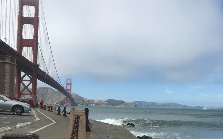 Golden Gate Bridge partially covered by Karl the Fog on a cool summer day in San Francisco