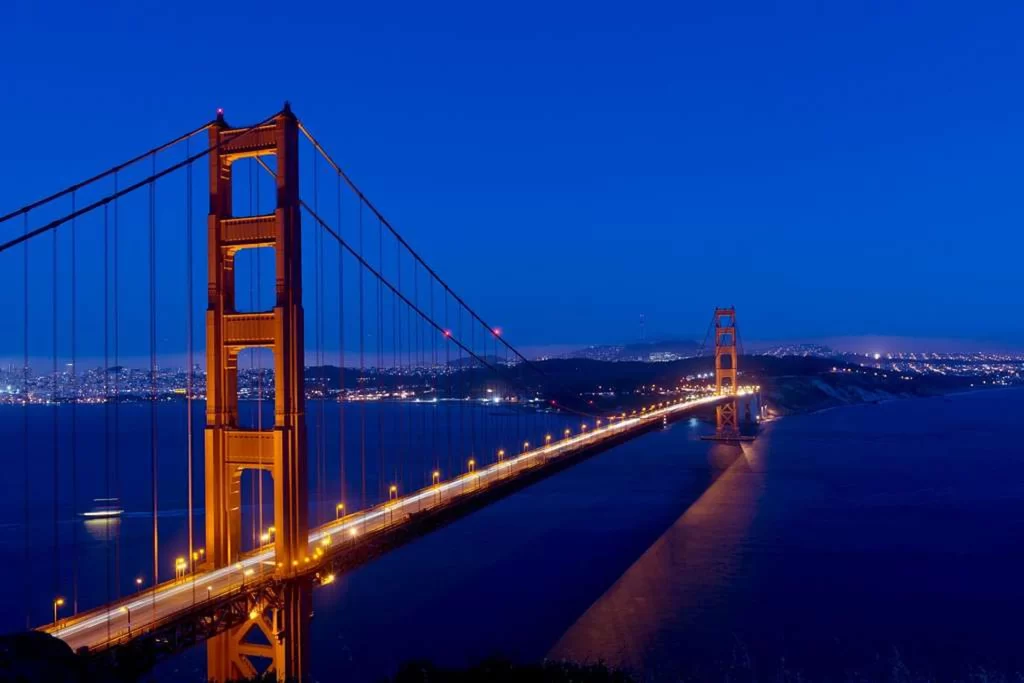 Golden Gate Bridge at Night. Picture taken from the Marin Headlands with San Fancisco and the Presidio in the distance. 