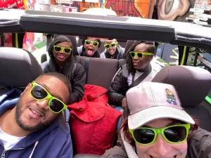 Tour guide Katya and guests taking a selfie at the start of a San Francisco Jeep sightseeing tour