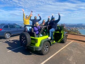 Tour guests enjoying views from the Marin Headlands during a private San Francisco Jeep sightseeing tour